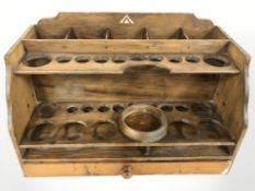 A wooden artists stand, width 42 cm.