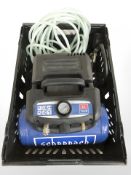 A Scheppach 1.6 horsepower compressor.