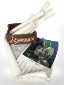 A quantity of unframed calendars, posters, etc.