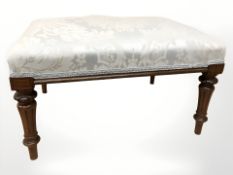 A Victorian style rectangular footstool, 67 cm.