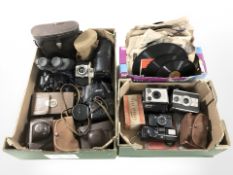 Assorted vintage cameras including Yashica, Kodak, various accessories,
