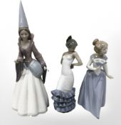 Three Nao figures of ladies, tallest 32 cm.