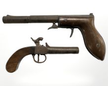 A 19th century percussion cap pocket pistol and a further under hammer target pistol, length 25 cm.