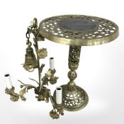 A pierced brass occasional table, height 46 cm, and a further brass pendant light fitting.