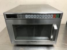 A Panasonic NE-1856 commercial benchtop microwave.