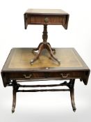 A reproduction mahogany drop leaf sofa table, length 103 cm unextended,