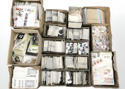 A vast quantity of modern monochrome postcards, loose stamps, etc.