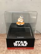 A Star Wars BB-8 app enabled droid, in perspex display case.