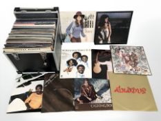 Vinyl LP records including Bob Marley and the Wailers, George Benson, Carly Simon, John Denver,