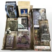 A group of Japanese anime figurines including Dante from Devil May Cry, Evangelion, Jin-Roh,