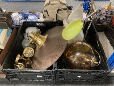 A group of table lamps and pendant light fittings, etched glass oil lamp shade, wall sconces.