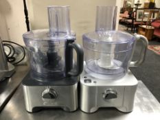 Two Kenwood multipro food mixers with accessories.
