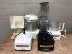 A group of blenders and similar culinary appliances.