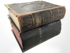 Two large Victorian Holy Bibles, one in leather binding with brass mounts.