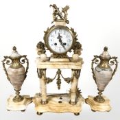 A 19th century French sienna marble and gilt metal mounted three piece portico clock garniture set,