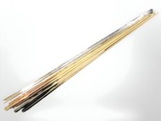 Six billiards cues including one marked C. Rogerson 7A Hood Street, Newcastle , one marked G.B.