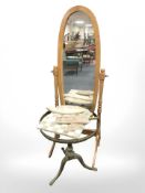 A contemporary cheval mirror,