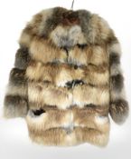 A lady's fox fur coat.