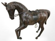 A leather model of a horse, height 43 cm.