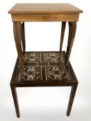 A Danish tile inset coffee table, width 44 cm, and an Italian inlaid musical table.