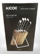 An Aicok six piece knife set, boxed.