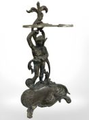 An Art Nouveau brass figural umbrella stand, height 60 cm.