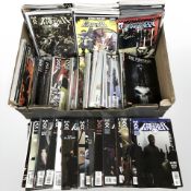 A collection of modern comic books including The Punisher and Moon Knight.