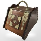 A Victorian walnut and brass coal receiver, length 50 cm.