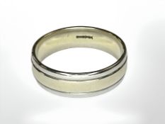 A 9ct two tone gold band ring, size R. CONDITION REPORT: 5.1g.