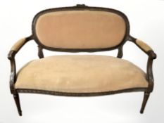 A carved beech two seater salon settee, length 124 cm.
