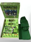 A Subbuteo table football set in box.