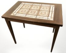 A Danish teak tile inset lamp table, width 59 cm.