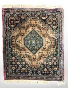 A Kashgai rug, South-West Iran, 93 cm x 69 cm.