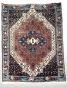 A Kashgai rug, South-West Iran, 156 cm x 113 cm.
