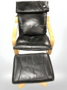 A Danish bentwood and black leather armchair and matching footstool