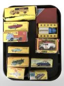 A group of boxed vintage and modern Dinky cars and wagons, including 229 Chevrolet Corvair,