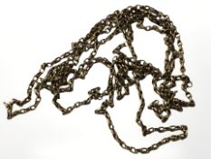 A Pinchbeck chain and a 1977 Jubilee crown in silver pendant mount.