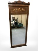 An early 20th century continental and mahogany satinwood inlaid mirror, 145 cm x 58 cm.