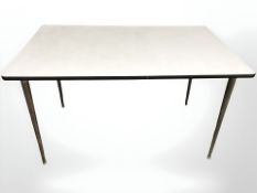 Two 20th century melamine topped kitchen tables, longest 125 cm.