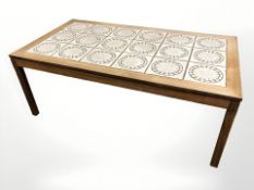 A 20th century Danish tile inset rectangular coffee table, 134 cm x 74 cm x 52 cm.