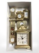 A group of miniature timepieces.