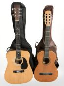 A Guvnor acoustic guitar and a Spanish classical guitar, with two soft carry cases.