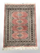 A Lahore Bokhara rug, Pakistan, 98 cm x 65 cm.