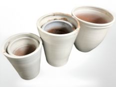 A group of ceramic plant pots,