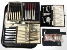 Several boxed sets of cutlery, napkin rings, cruet set, etc.