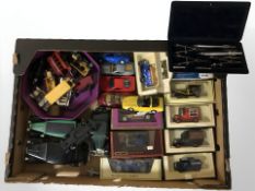 A group of boxed and un-boxed die cast cars including Matchbox, Days Gone,