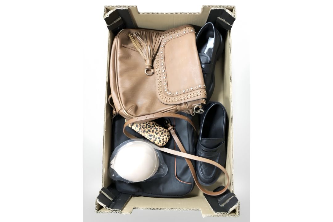 A rail of lady's clothing, leather hand bags, etc. - Image 2 of 2