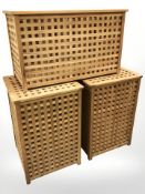 Three teak lattice laundry hampers,
