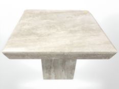 A contemporary travertine square pedestal lamp table,