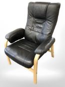 A Danish bentwood and black stitched leather armchair.